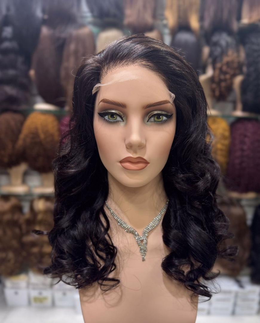 Lace-front body-wave wig closeup on mannequin face, multi-color wig wall background